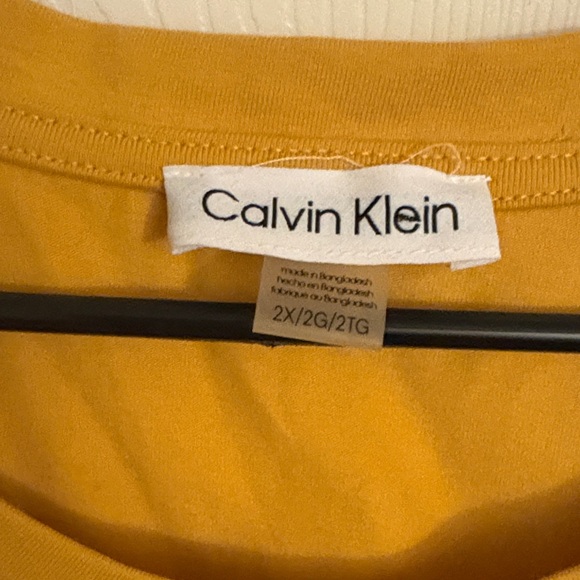Calvin Klein Gold Logo Mustard Dress
NWT - Picture 2 of 7